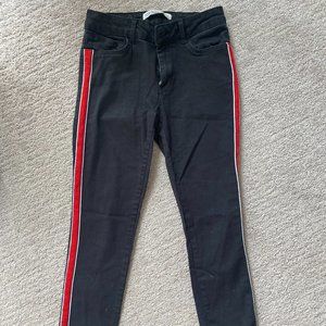 Black skinny jeans with stripe